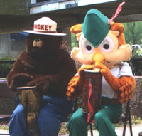 Smoky The Bear and Woodsy The Owl enjoy a Roots To Rhythm drum circle at the Marietta Earth Day Festival 2006.